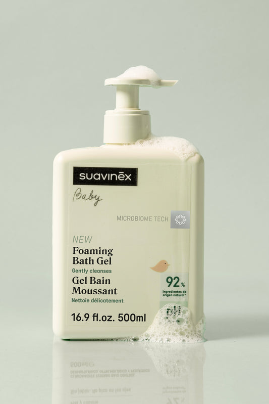 Suavinex Foaming Bath Gel bottle on a light green background