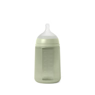An green Suavinex Color Essence silicone baby bottle with a medium flow nipple.